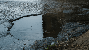 road pothole damage hidden rim and tyre