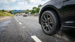 car tyre driving on road